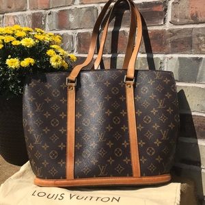 Louis Vuitton Babylone tote bag w Neiman’s receipt